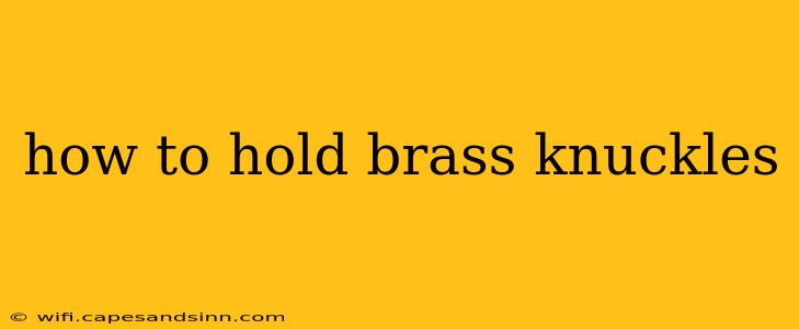 how to hold brass knuckles